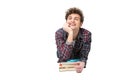 Male student leaning on the table with books Royalty Free Stock Photo