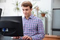 Male student using computer in university Royalty Free Stock Photo