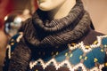 Male stylish winter scarf on a mannequin in men clothing store