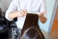 Male stylist hands combing wet hair at salon Royalty Free Stock Photo