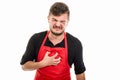 Male supermarket employer holding chest like in pain