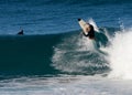 A male surfer smashing a frontside top-turn off-the-lip at Iluka`s North Wall.
