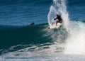 A male surfer smashing a frontside top-turn off-the-lip at Iluka`s North Wall.