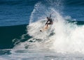 A male surfer smashing a frontside top-turn off-the-lip at Iluka`s North Wall.