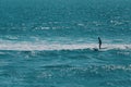 Male surfer waiting for the biggest wave in the ocean Royalty Free Stock Photo