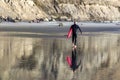 Male Surfer with Red Surf Board on Torrey Pines Beach in San Diego California Royalty Free Stock Photo