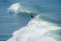 Male surfers enjoying the big wave in Oceanside in North San Diego, California, USA. Royalty Free Stock Photo