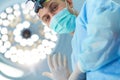 Male surgeon on background in operation room Royalty Free Stock Photo