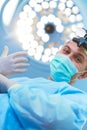 Male surgeon on background in operation room Royalty Free Stock Photo