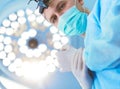 Male surgeon on background in operation room Royalty Free Stock Photo