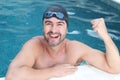 Male swimmer celebrating a victory Royalty Free Stock Photo