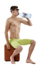Male swimmer drinking water