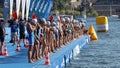 Male swimming competitors waiting for the start signal