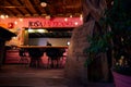 Male on the table at Rosa Mexicano Restaurant in Holbox, Mexico at night