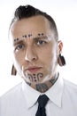 Male with tattoos wearing tie