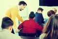 Male teacher clearing up complicated issue to pupil during exam Royalty Free Stock Photo