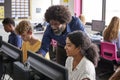 Male Teacher Helping Teenage Female High School Student Working In Computer Class Royalty Free Stock Photo