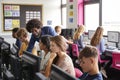 Male Teacher Helping Teenage Female High School Student Working In Computer Class Royalty Free Stock Photo