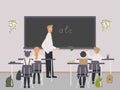 Male Teacher Of Philology Explaining English Letters To Elementary School Pupils Or Children Near Chalkboard. Man Teaching