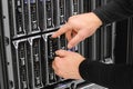 Male Technical Consultant Installing Blade Server In SAN At Data Royalty Free Stock Photo