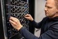 Male Technical Consultant Monitoring Modern Hyperconverged Servers in Datacenter Royalty Free Stock Photo