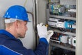 Male Technician Checking Fusebox Royalty Free Stock Photo