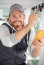 male technician doing meter reading using tablet Royalty Free Stock Photo