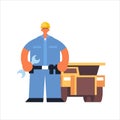 Male technician mechanic wearing hard hat busy workman holding wrench industrial construction worker in uniform building