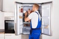 Technician Repairing Refrigerator Royalty Free Stock Photo