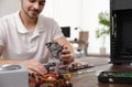 Male technician repairing computer at table Royalty Free Stock Photo