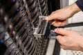 Male Technician Replacing Server Drive At Datacenter