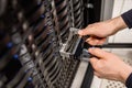 Male Technician Replacing Server Drive At Datacenter