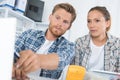 Male technician teaching female counterpart Royalty Free Stock Photo