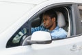 Male Teenage Driver Looking Out Of Car Window Royalty Free Stock Photo