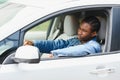 Male Teenage Driver Looking Out Of Car Window Royalty Free Stock Photo