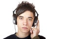 Male Teenager with headphone looking seriously