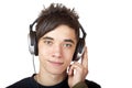 Male Teenager listening to music and smiles happy