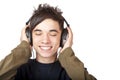 Male Teenager listening to music via headphone