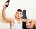 Male teenager taking selfie