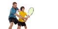 Male tennis player, coach training with teen to play tennis isolated over white studio background. Concept of sport Royalty Free Stock Photo