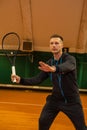 male tennis player on the court looks happy doing his hobby. Royalty Free Stock Photo