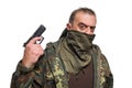 Male terrorist. military jacket. gun in his hand