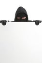 Male thief with blank poster on white background