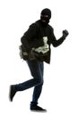 Male thief holding briefcase with money on white background