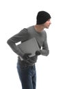 Male thief with laptop on white background