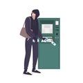 Male thief stealing money banknotes from ATM. Young angry man in hoodie committing crime. Theft or burglary in bank