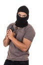 Male thief wearing mask and holding gun isolated Royalty Free Stock Photo