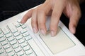 Male touchpad computer working at home office hand on touch pad close up. Royalty Free Stock Photo