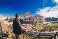 Male tourist enjyoing the view at the Colosseum in Rome, Italy