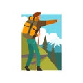 Male Tourist Hiking in Mountains with Backpack and Staff, Man Pointing at Something in Summer Mountain Landscape